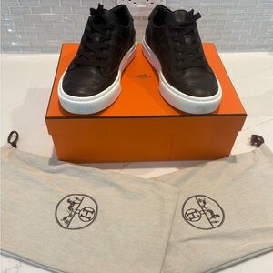 Hermes Black Leather Deep Sneakers women’s size 8 with shoe bags. Gently worn.